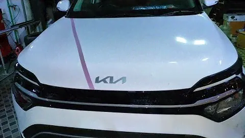 Kia carens original subwoofer amp location